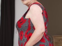 Redheaded granny has her big boobs fondled while being masturbated - Photo #3