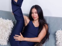 Long haired beauty doffs a tight jumpsuit for great nude poses on a sofa - Photo #2