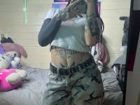 Brunette teen takes selfies while stripping to her thong on a bed - Photo #5