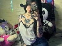 Brunette teen takes selfies while stripping to her thong on a bed - Photo #18