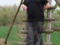 Redhead granny Sheila reveals her swollen vagina on an outdoor ladder - Photo #1