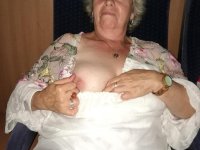 Far grandmother Caro flashes pubic hairs that escape her upskirt underwear - Photo #20