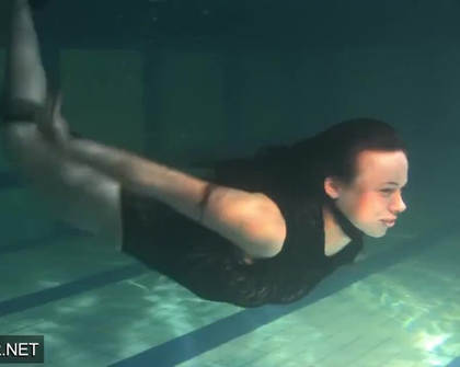 Shaved brunette sissy Irina Polcharova naked in the pool